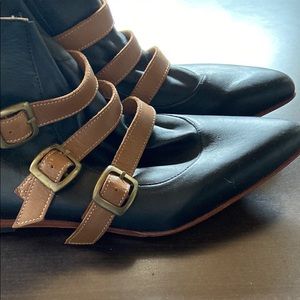 Fluevog boots. Black with tan straps. Size 7 US.